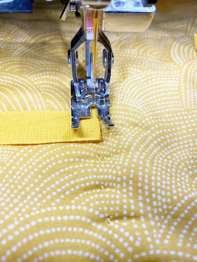 Quilted Travel Roll: Stitch the ribbon on the inside